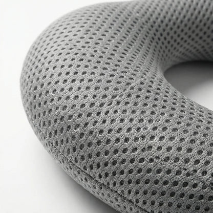Coussin cervical bureau respirant — vue détail matière et texture